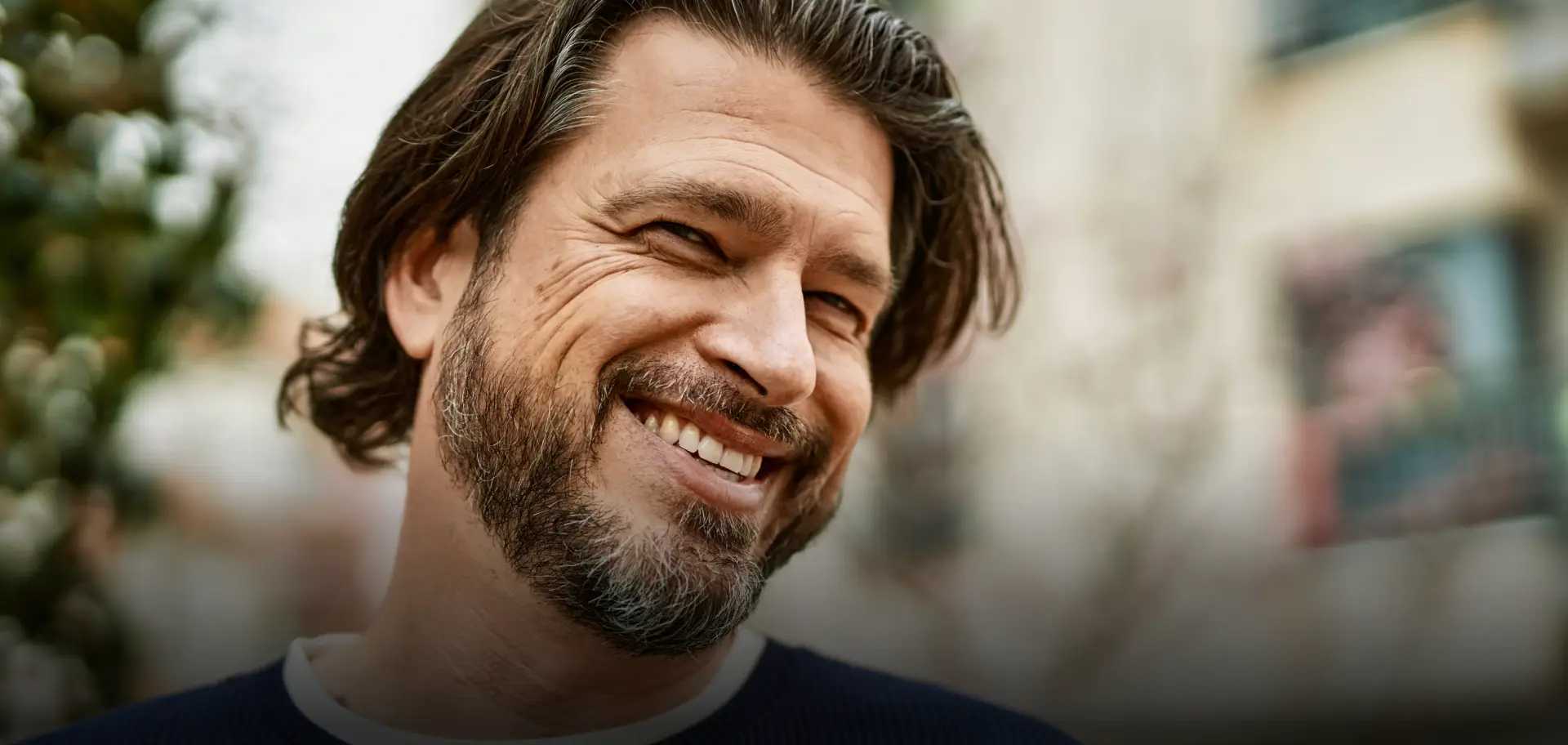 Middle-aged man in the Greater Toronto Area, shadowed portrait